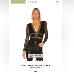 black revolve bodysuit. Size medium. Rly flattering!